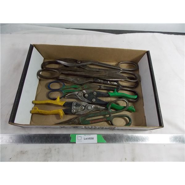 7 varying sizes of tin snips