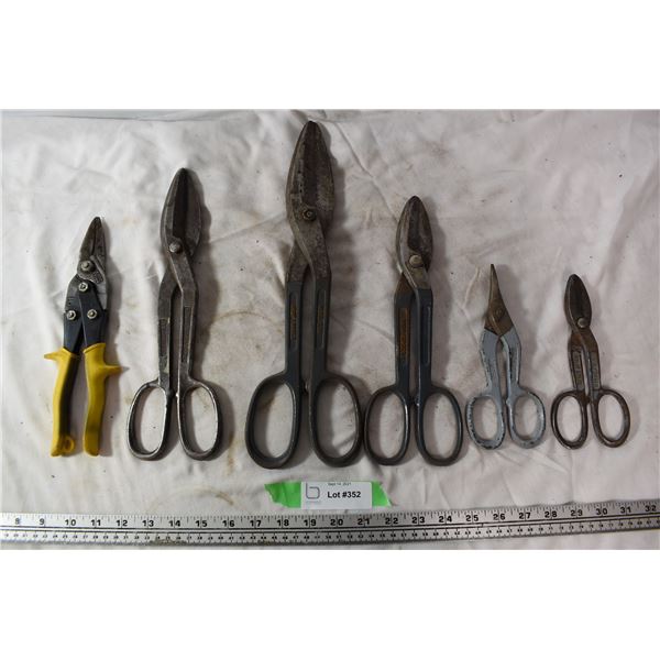 6 tin snips (varying sizes)