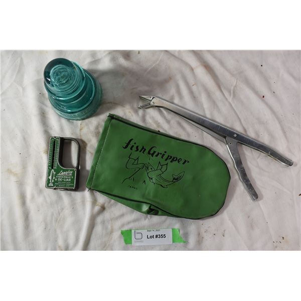 Assorted fishing gear. Glass insulator. Spiked fishing glove.