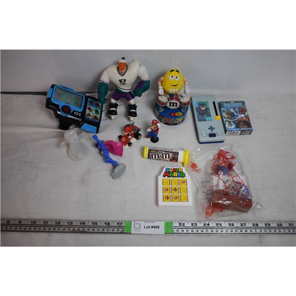 Misc small toys, mighty duck, m&m drummer, etc