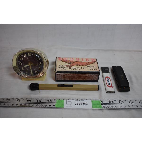 Baby ben clock, matchbox, hohner harmonica, bbq lighter