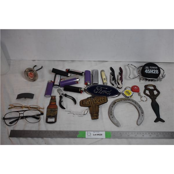 Lot of trinkets, bottle openers, pocket knife, lighters, misc
