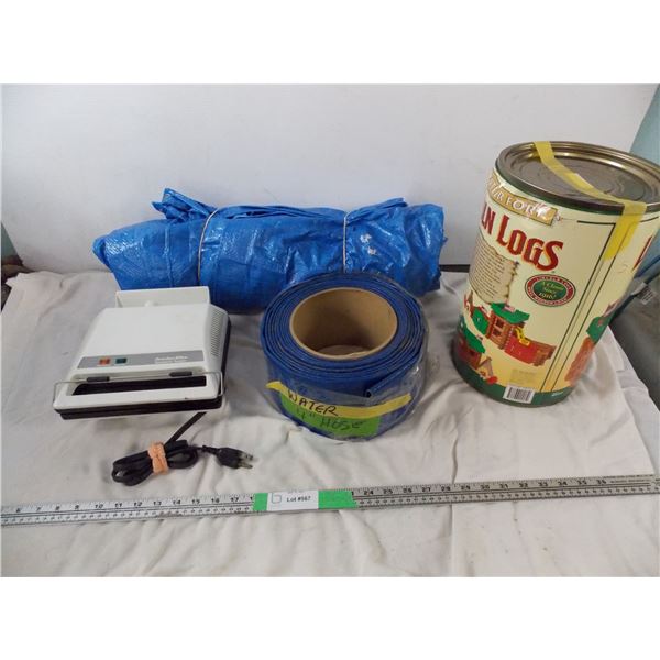 building blocks, tarp, sandwich maker + 4" water hose