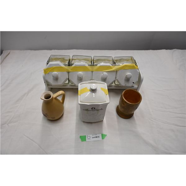 Glass Storage containers (with wood lids) on rack with ceramic + wood storage containers