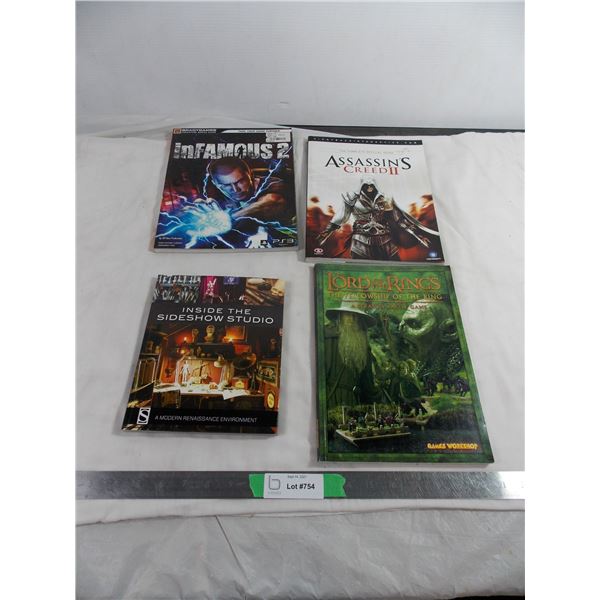 Inside the Sideshow studio + Lord of the Rings game book + Assassins Creed 2 play through guide + In
