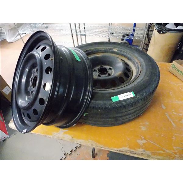 Tire with 2 rims, tire has no tread.