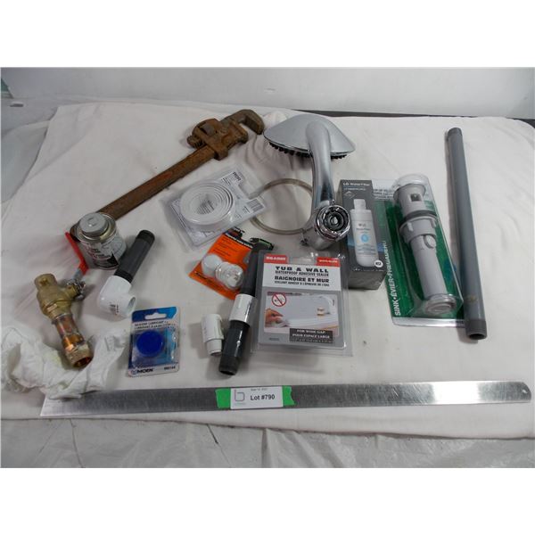 Plumbing supplies and plumbers wrench + shower head