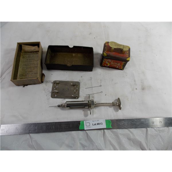 vintage syringe + shoe shine tin with marbles