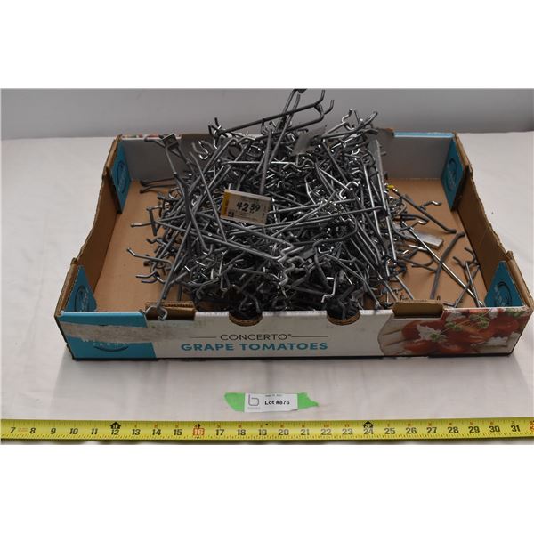 Box of store shelving wall pegs
