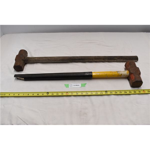 pair of sledgehammers, one broken handle