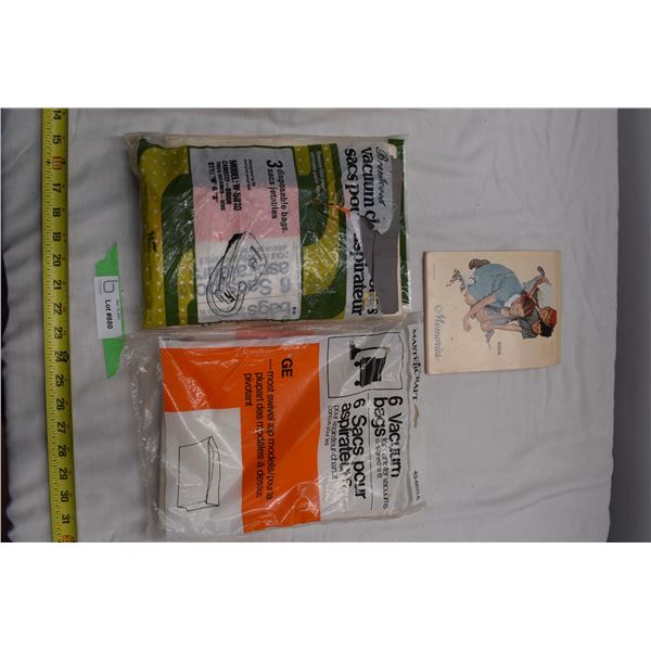 Various vacuum bags + normal rockwell note pad