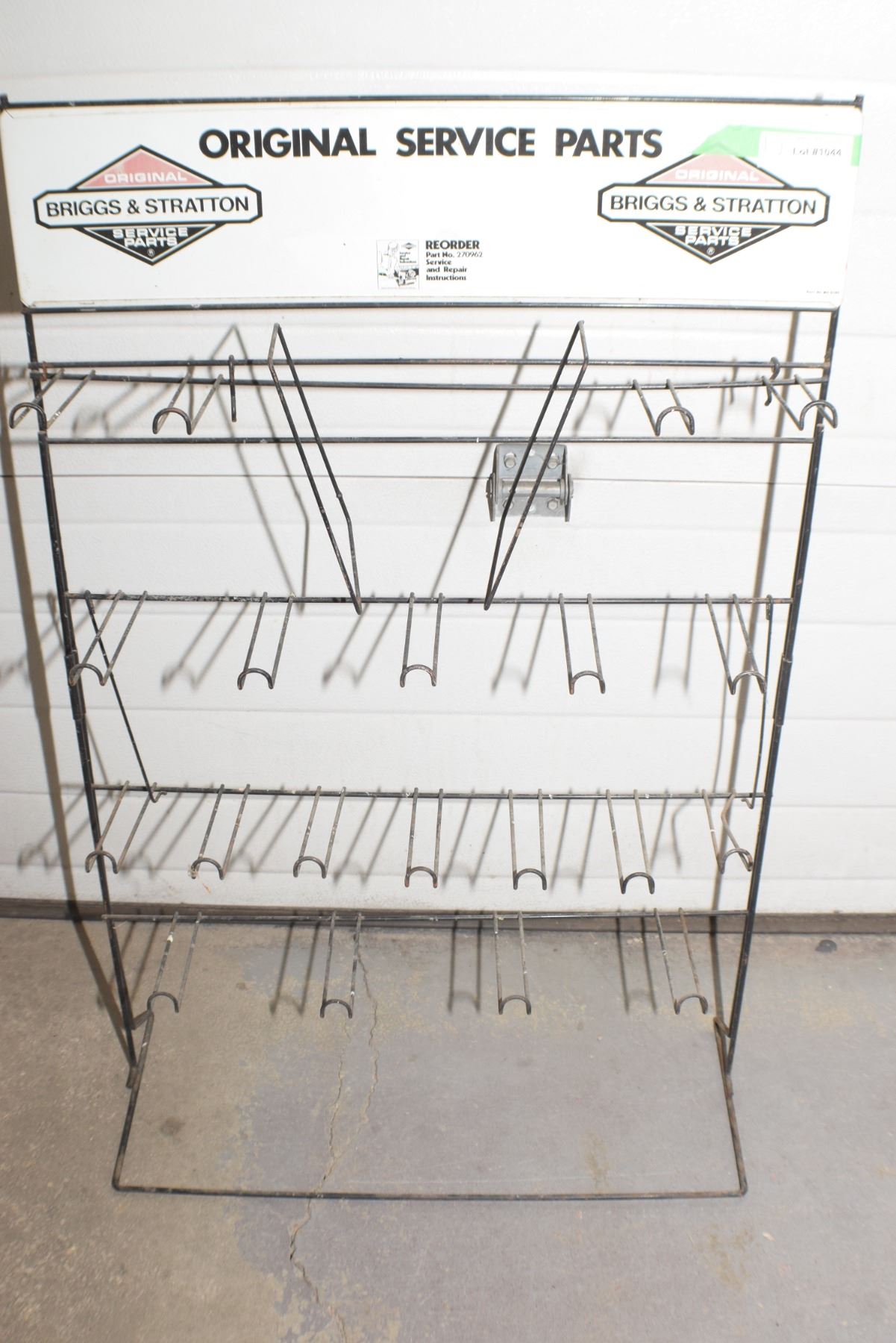 Small Engine Parts Rack ANTIQUE BRIGGS & STRATTON ENGINE PARTS RACK - Bodnarus Auctioneering