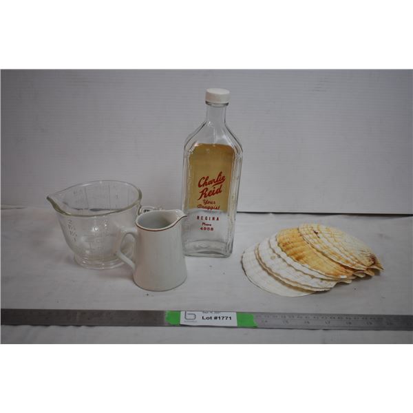 Seashells + Glass Bottle with vintage Measuring Glass