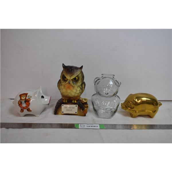 4 different piggy banks, one brass, one glass, two ceraic