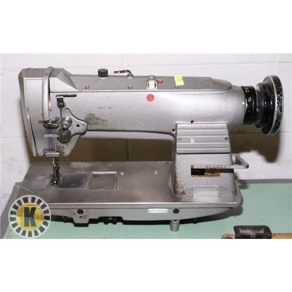 CONSEW INDUSTRIAL SEWING MACHINE WITH TABLE