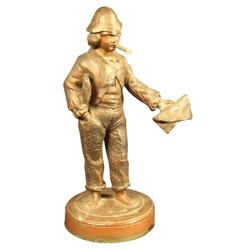 Figural cast iron cigar lighter, newsboy