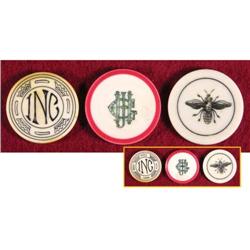 Three Ivory Poker Chips