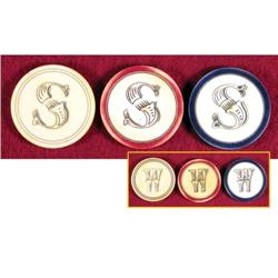 Three Ivory Poker Chips