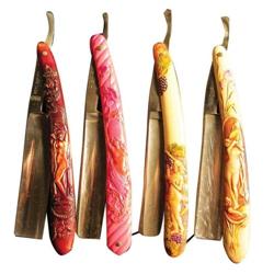Four Celluloid Handled Straight Razors