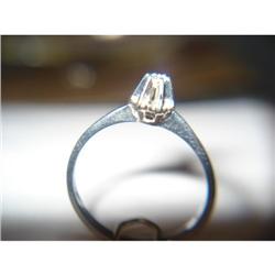 0.06 CTS DIAMOND RING