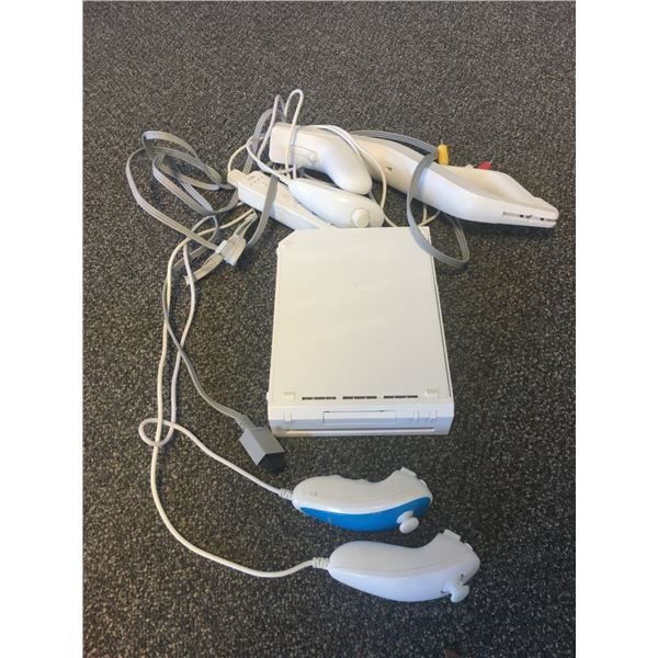 Wii system with Many Accessories INCLUDING ROCKBAND GUITAR - Works