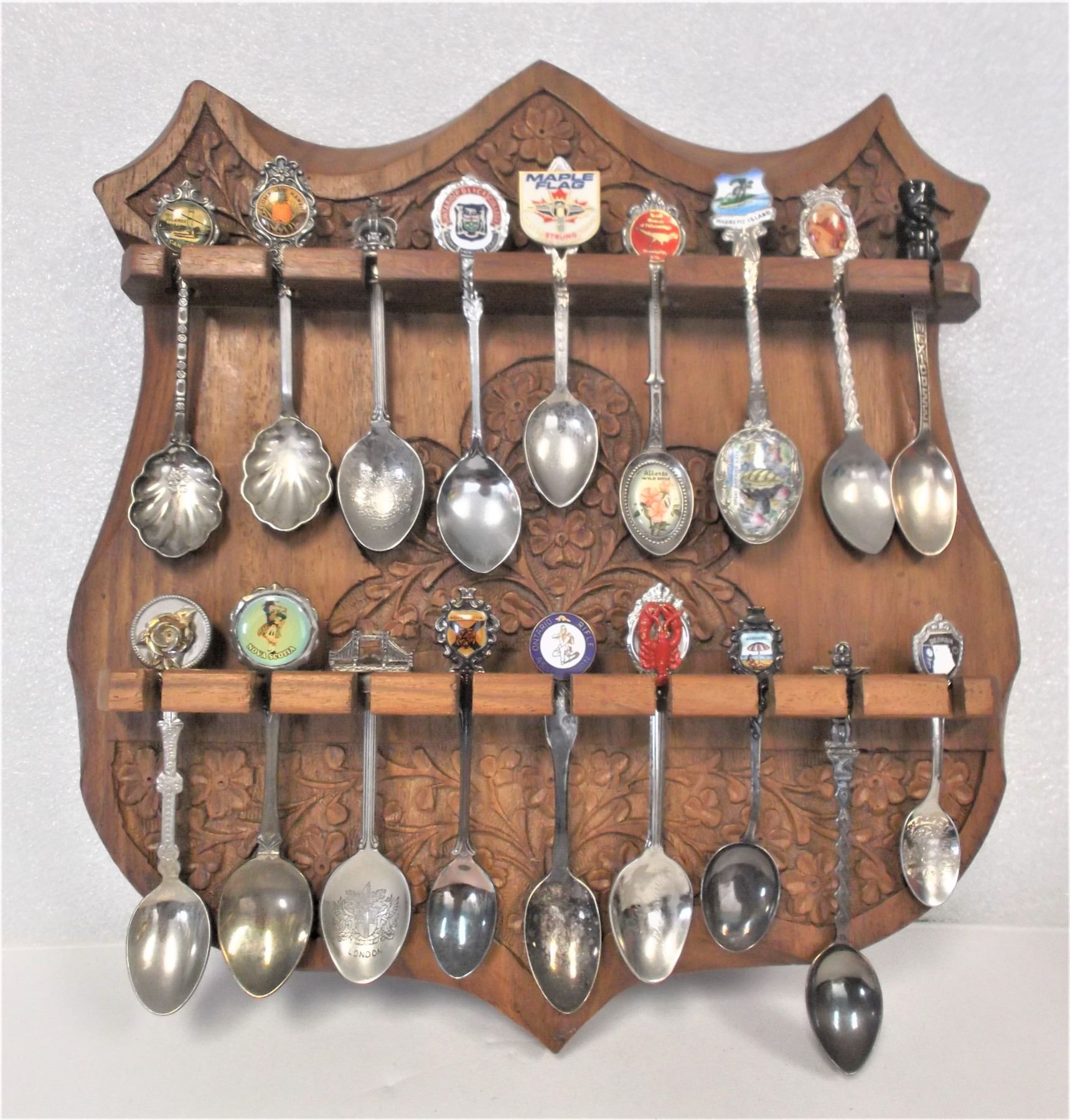 Collector Spoons in Display Rack