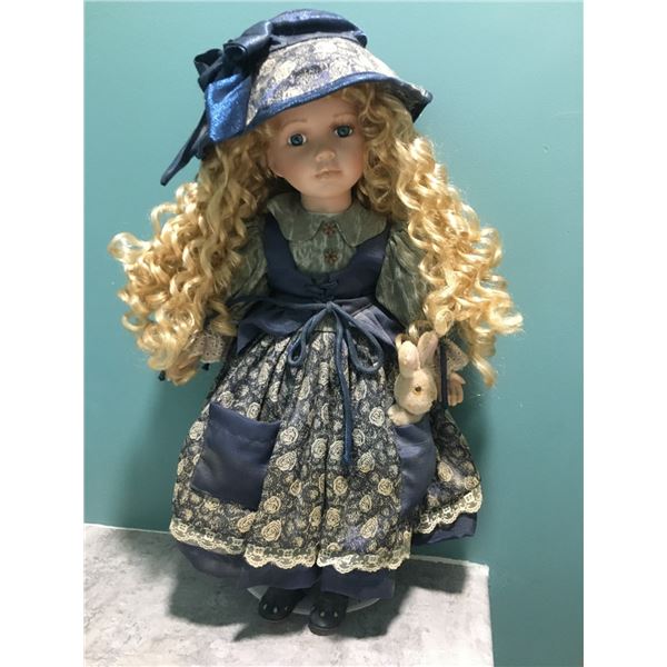 Porcelain Doll with Stuffed Bunny and Stand