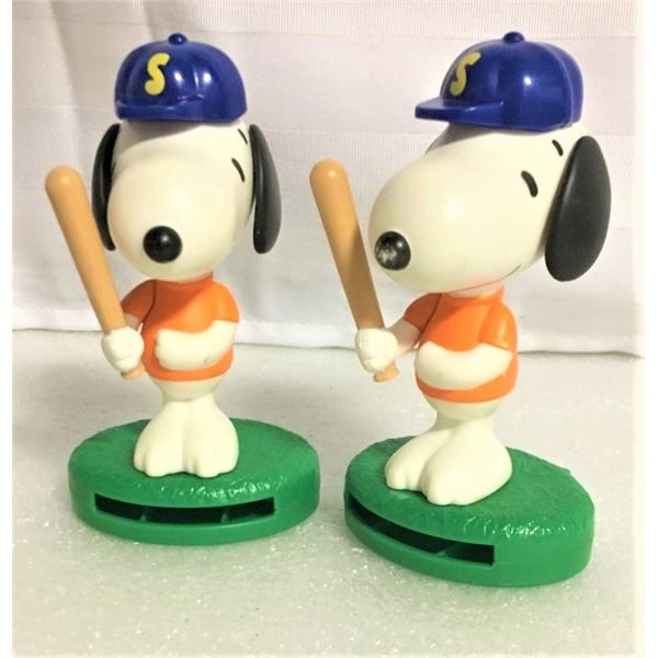 Two Snoopy Figurines