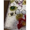 Image 2 : TRAY OF NEW GLOW IN THE DARK INSECT KEYCHAINS AND NECKLACES