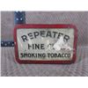 Image 5 : Repeater Fine Cut Tin with Blue Rocks in it