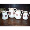 Image 1 : Set of Four French Ceramic Pitchers #2061974