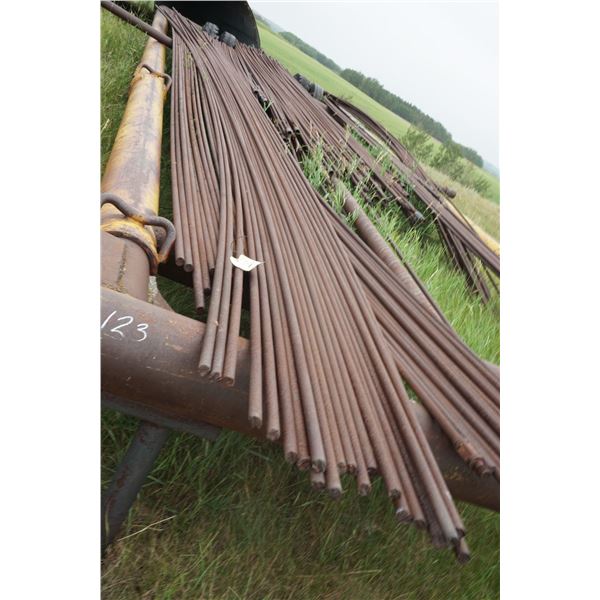 Sucker Rod on Trailer (2 pics)