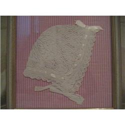 antique baby cap under glass #2026552