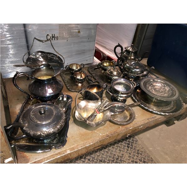 Shelf lot full of assorted silver plate serving pieces - approx. 25 pcs.