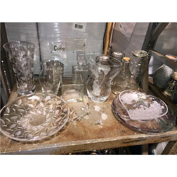 Shelf lot full of assorted decorative glassware - vases/ bowls/ small figurines etc.