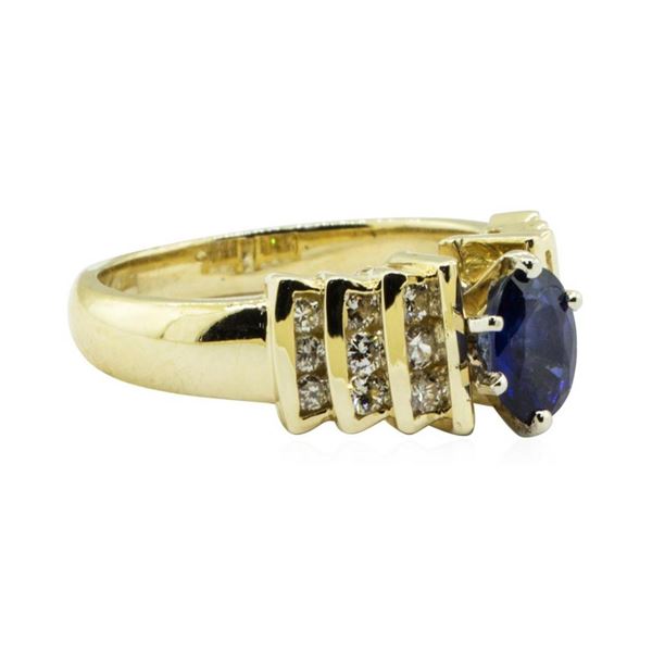 1.30 ctw Oval Brilliant Blue Sapphire And Diamond Ring - 14KT Yellow Gold