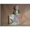 Porcelain figurine of a sweet little girl. #2036523