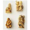 Image 1 : A SMALL CARD OF CARVED NETSUKE FIGURES.