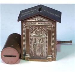 Lot of 2 brass small banks 1 is tubular and 1 is a bras