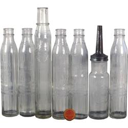 Lot of 7 Tall Oil Co. Bottles