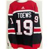 Image 1 : JONATHAN TOEWS SIGNED BLACKHAWKS ADIZERO REVERSE RETRO JERSEY 28/119 (FRAMEWORTH COA)