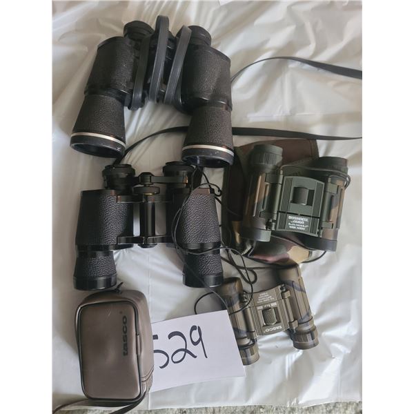 Assorted Binoculars of assorted Strengths