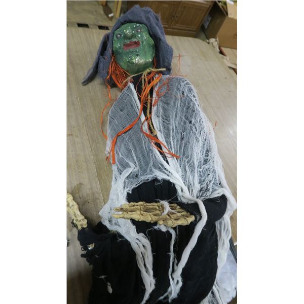 Floating Yard Witch on stake