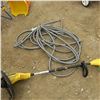 Image 1 : Grass Trimmer and Garden Hose
