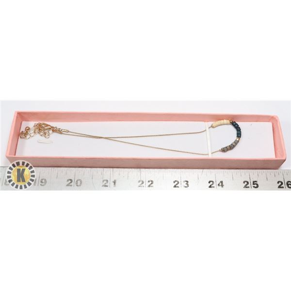 CHILDS NECKLACE WITH INTRICATE BEADS