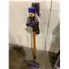 Image 1 : DYSON STICK VAC WITH ACCESSORIES AND CHARGER MODEL #UNKNOWN (TESTED WORKING)