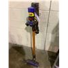 Image 1 : DYSON STICK VAC WITH ACCESSORIES AND CHARGER MODEL #UNKNOWN (TESTED WORKING)