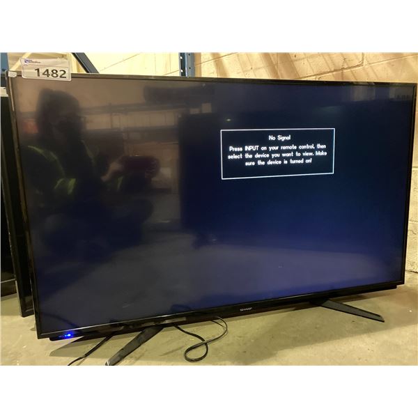 SHARP 50" TV LC-50LB261U WITH STAND AND POWER CORD, NO REMOTE (2 SMALL MARKS IN SCREEN)