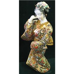Oriental porcelain statue