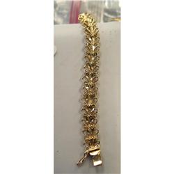 Lady's 14 kt Gold Floral Bracelet